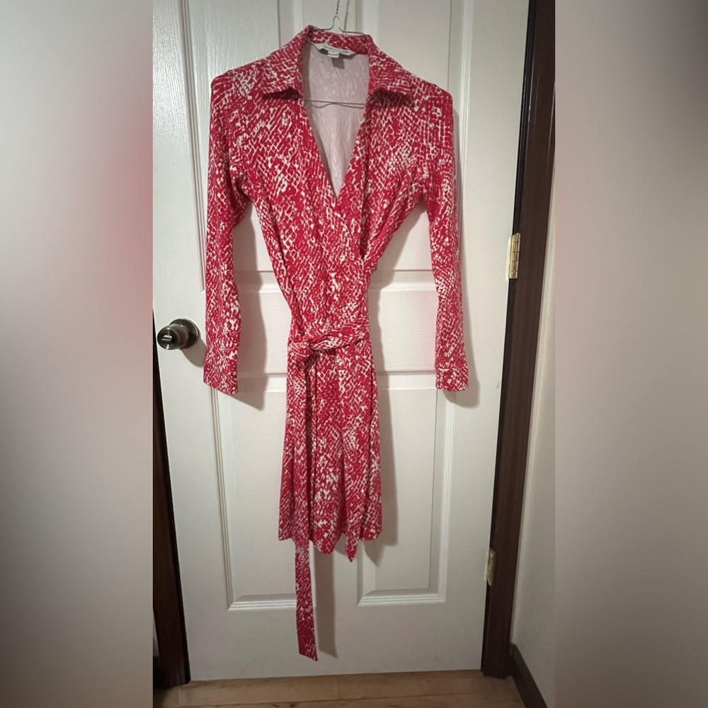 Diane Von Furstenberg wrap dress. Snakeskin print, fuschia pink.  Size 10.